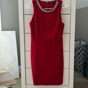 Red size 3 semiformal dress with jeweled neckline.